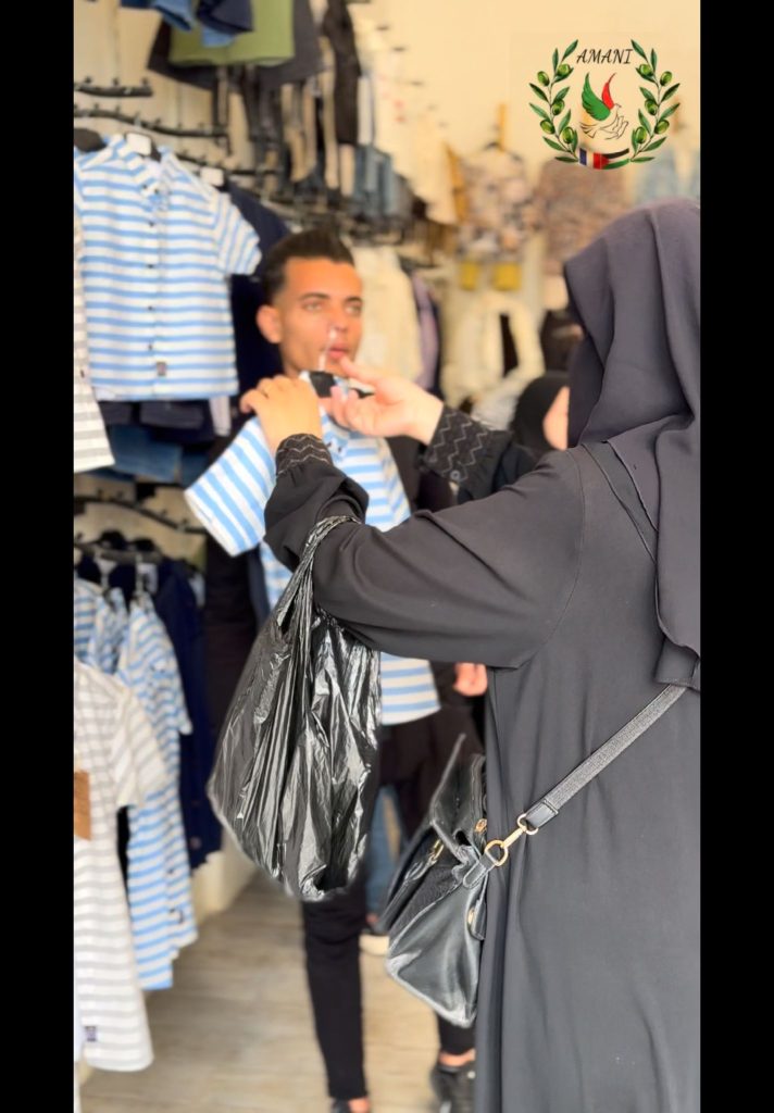 Association Amani - Aïd al-Adha à Gaza : Un grand festival de soutien psychologique pour les orphelins - 2026 05 20 distribution vetements aid gaza 42